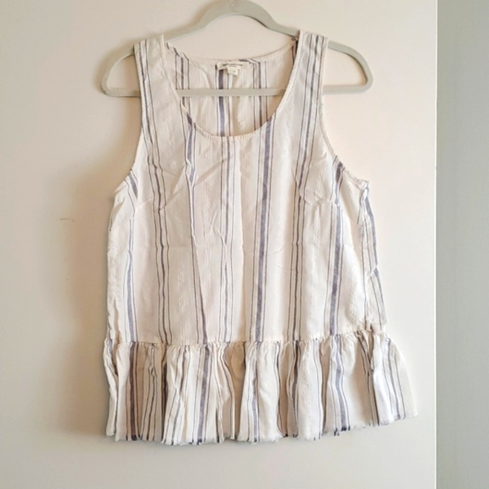 Sleeveless Peplum Top